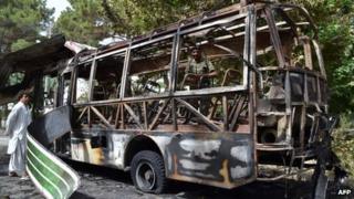 Weeping relatives gathered to identify the charred remains of loved ones killed in a double attack in Pakistan"s troubled southwest claimed by a
