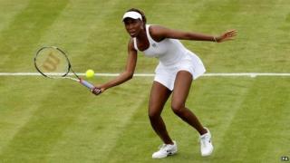 Venus Williams playing on grass court
