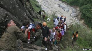 The Indian Army is rescuing people from flood-affected areas in Uttarakhand and Himachal Pradesh states