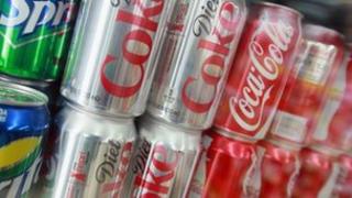 cans of fizzy drinks