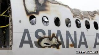 In this undated handout from the National Transportation Safety Board (NTSB), Asiana Airlines flight 214 is seen at at San Francisco International Airport in San Francisco, California.