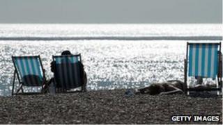 Sunbathers in Brighton on 20 July 2013