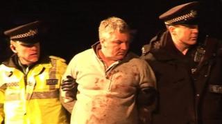Marc McLees being arrested in Bridge Street, Leighton Buzzard