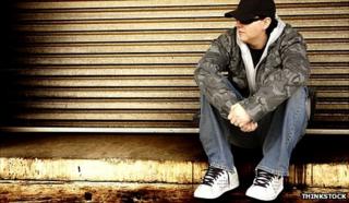 Posed photo of a man wearing a camouflage jacket