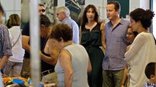 Samantha and David Cameron at a fish market