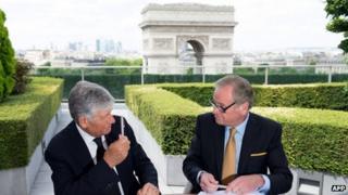 Maurice Levy and John Wren signing merger agreement