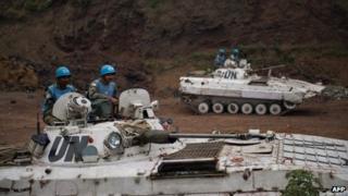 Indian peacekeepers as part of the UN mission in the DR Congo behind Congolese army lines in an abandoned quarry in Munigi, 8km from Goma on 19 July 2013.