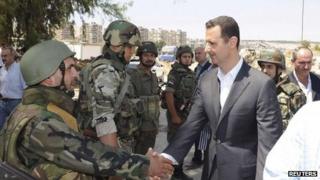 President Bashar al-Assad in Daraya, south-west of Damascus on 1 August