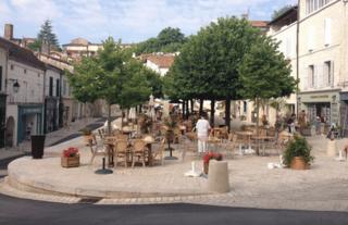 Cafe tables in the French village of Aubeterre-sur-Dronne