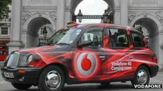 taxi with vodafone logo