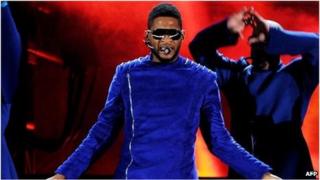 R&B singer Usher on stage in Los Angeles, California on 13 February 2011