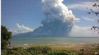 Photo taken from the Maurole district of East Nusa Tenggara province with a camera phone shows Mount Rokatenda volcano spewing a huge column of hot ash during an eruption on 10 August