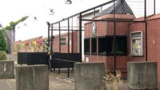 The attack happened at Woodbourne police station in west Belfast