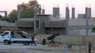 Kurdish fighters clash with al-Nusra militiamen near the Turkish border, 2 Aug
