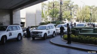 UN vehicles transporting a team of United Nations chemical weapons experts arrive in Damascus on 18 August 2013