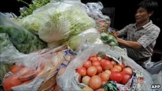 Man holding food bags