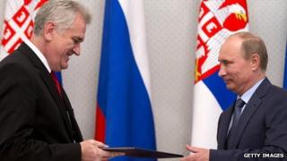 Tomislav Nikolic and Vladimir Putin exchanging documents in May 2013