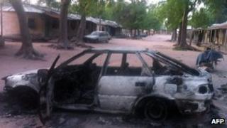 A burnt vehicle after a suspected Boko Haram attack in Bama, Nigeria. Photo: May 2013