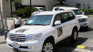 UN experts leave a hotel in Damascus, Syria, Friday, 30 August, 2013.