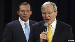 File photo: Kevin Rudd (right) and Tony Abbott at a People's Forum in Brisbane, 21 August 2013
