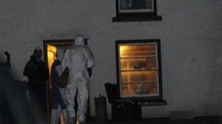 Forensic investigators at the scene of the shooting at the farm in Glenarm