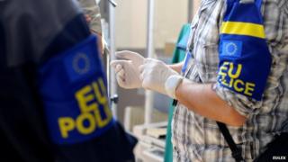 Unidentified Eulex police officers in 2011 dated photograph