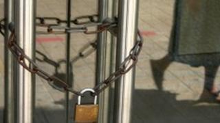 closed bank with lock around it
