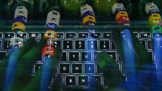Computer graphic showing hands and a keyboard