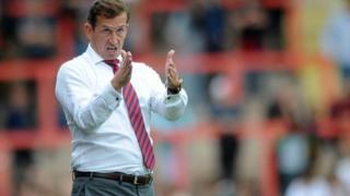 Justin Edinburgh on the sidelines with Newport County.