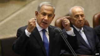 Israeli Prime Minister Benjamin Netanyahu delivers a speech during the opening of the Knesset (Israel's parliament) winter session