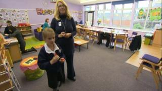 parent with child in classroom