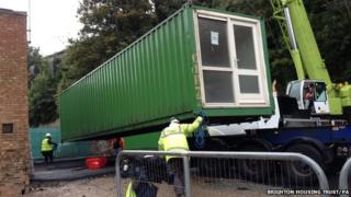 Brighton shipping container homes begin arriving - BBC News