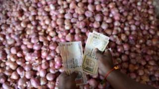Analysts say rising onion prices will affect the ruling Congress party's chances in upcoming state polls