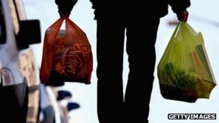 Shopping bags being carried