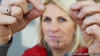 Siv Kristin Saellmann with her cross