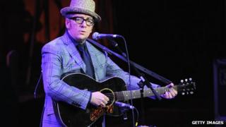 Elvis Costello in hat