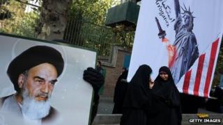 People attend a demonstration to mark the 34th anniversary of the 1979 US embassy takeover November 4, 2013 in Tehran, Iran.