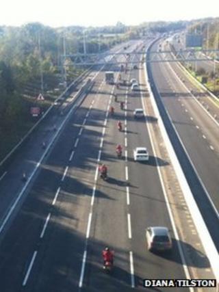 Bikers in red on the M25 on Remembrance Sunday