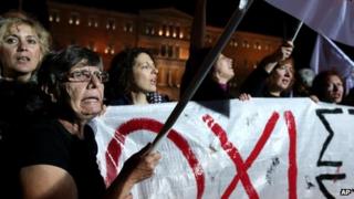 Rally outside Greek parliament in Athens, 10 November 2013
