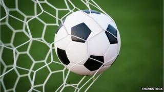Football going into net
