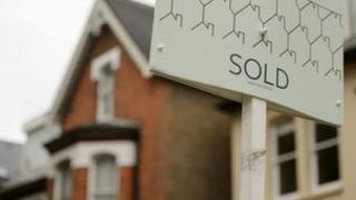 Sold sign outside house