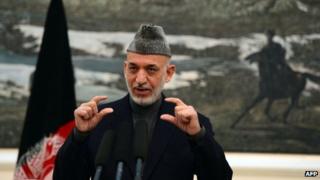 The Afghan president, Hamid Karzai, addresses a press conference in Kabul on 16 November.