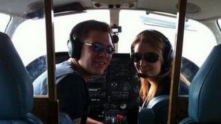 Paul Tribble and Elizabeth Geeves inside a cockpit