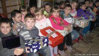 Children receiving presents in Ukraine