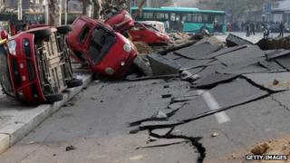A general view of the damage after a oil pipeline exploded in Qingdao, China, on 22 November 2013