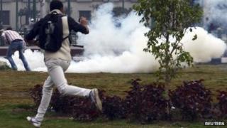 Protester and tear gas, Tahrir 1/12/13