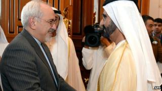 Mohammad Javad Zarif with UAE Prime Minister and Dubai ruler Sheikh Mohammed bin Rashid on 4 December 2013