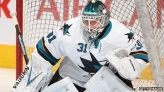San Jose Sharks goalie Antti Niemi warms up before game on December 3, 2013.