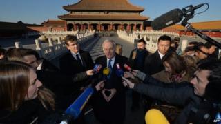 File photo: Foreign media in China interviewing French Prime Minister Jean-Marc Ayrault (C) in Beijing's Forbidden City