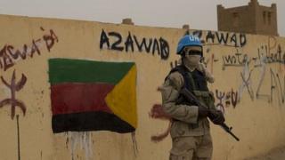 UN peacekeeper guards polling station in Kidal. 14 Dec 2013